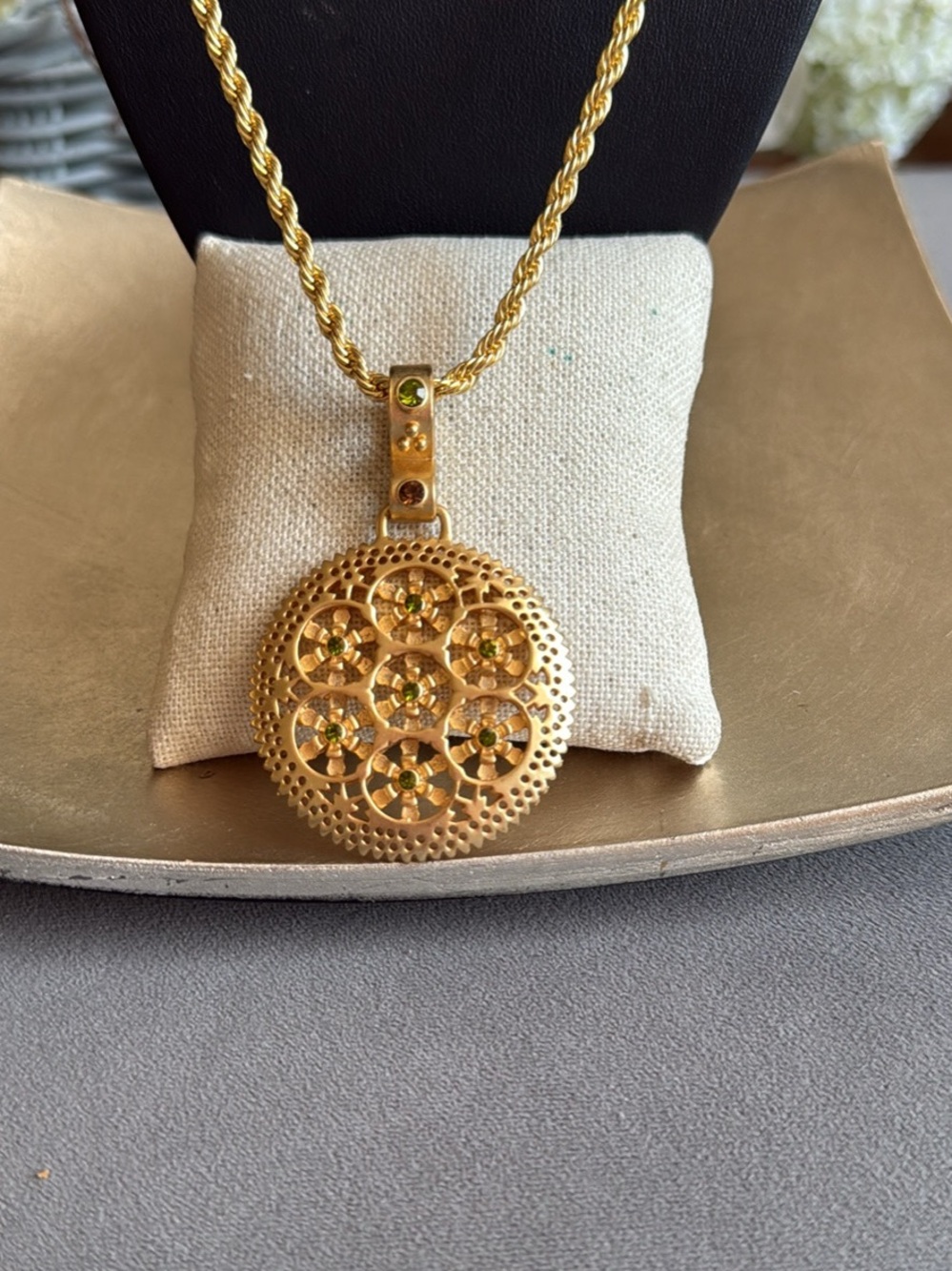 Gold Floral Disk Pendant Necklace with Green Crystal Accents